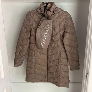 Calvin Klein beige mid-length size small light packable jacket.